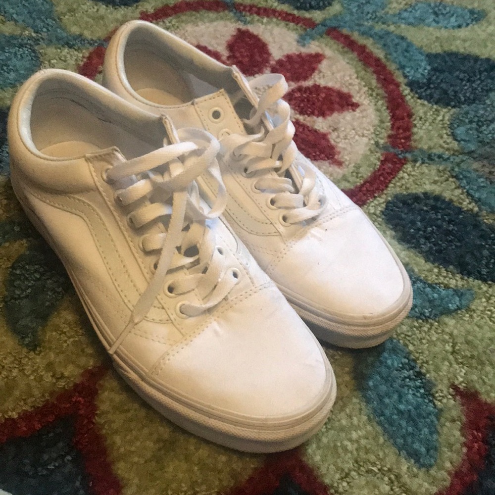 All white low sk8 vans